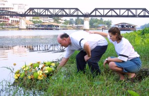 The Arscott and Lloyd families visit Thailand to Meet with Thai Officials and Pay Respect to their children, Vanessa Arscott and Adam Lloyd, who were gunned down by a Thai policeman in Kanchanaburi, Thailand Graham and Alyssa Arscott float a wreath on to the 'Kwae Noi' river in Kanchanaburi. The Bridge Over The River Kwai in the background.