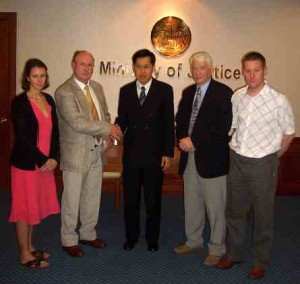 Allysa and Graham Arscott, (l) and Brian and Chris Lloyd (r) meet with Thailand's Justice Minister Pongthep Thepkanjana to discuss the trial of Somchai Wisetsingh - the Thai police Sergeant accused of the September 2004 murder of British backpackers Vannessa Arscott and Adam Lloyd.