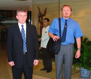 Chief Inspector Steven Wilkins (left) and Crime Scene Manager Richard Griffith, of Dyfed Powys Police leave the Hilton Hotel in Bangkok, Thailand, after picking up the evidence in the Kirsty Jones murder case from the Royal Thai Police.